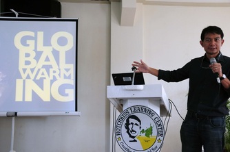 Gerry conducting a seminar on global warming